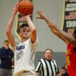 Grace Christian senior guard C.J. Gettelfinger shoots over Cam Thomas of Oak Hill Academy on Dec. 15, 2018. (Photo: Danny Parker)