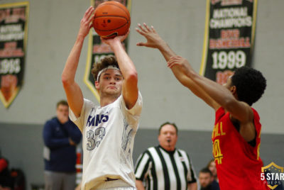 Grace Christian senior guard C.J. Gettelfinger shoots over Cam Thomas of Oak Hill Academy on Dec. 15, 2018. (Photo: Danny Parker)